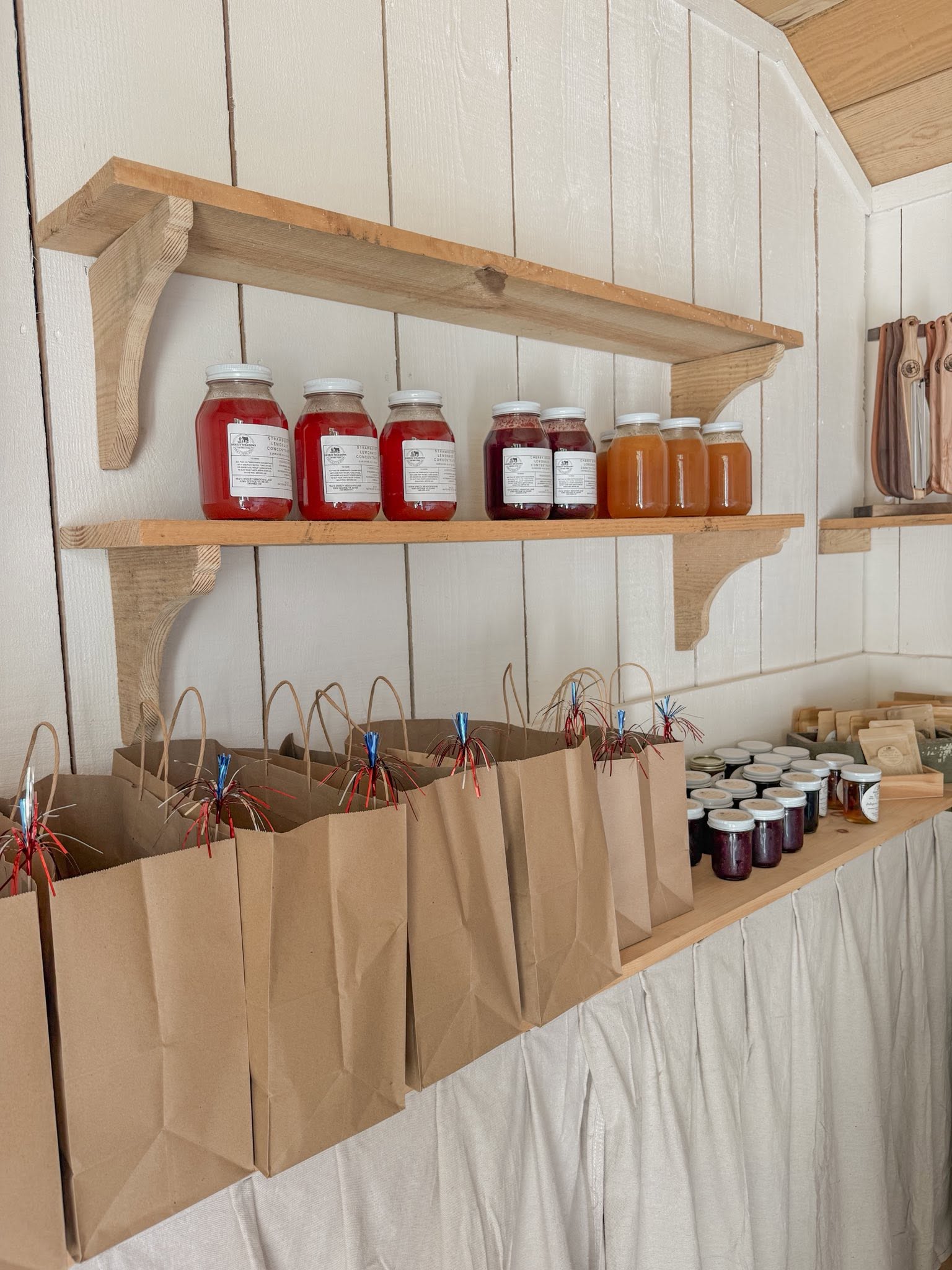 inside of breezy meadows farmstand featuring jarred and bagged goods